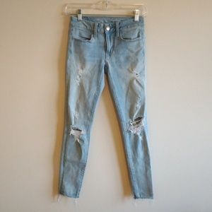 AMERICAN EAGLE JEGGINGS LIGHT WASH DISTRESSED SUZE 00